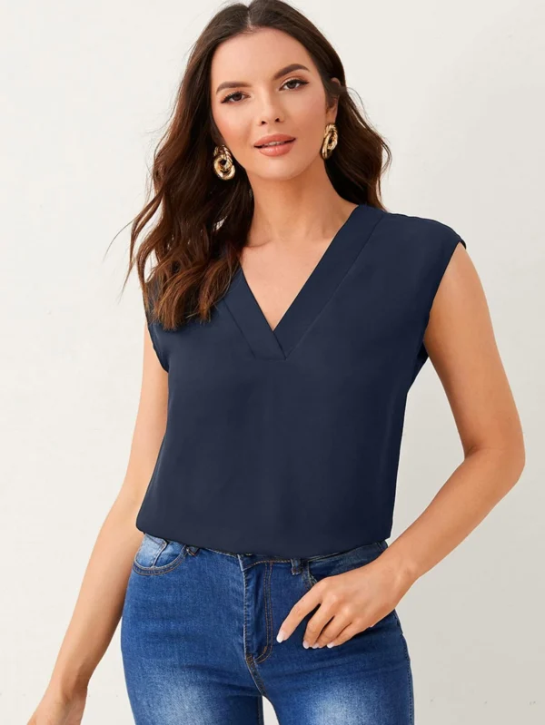 Top unicolor escote V