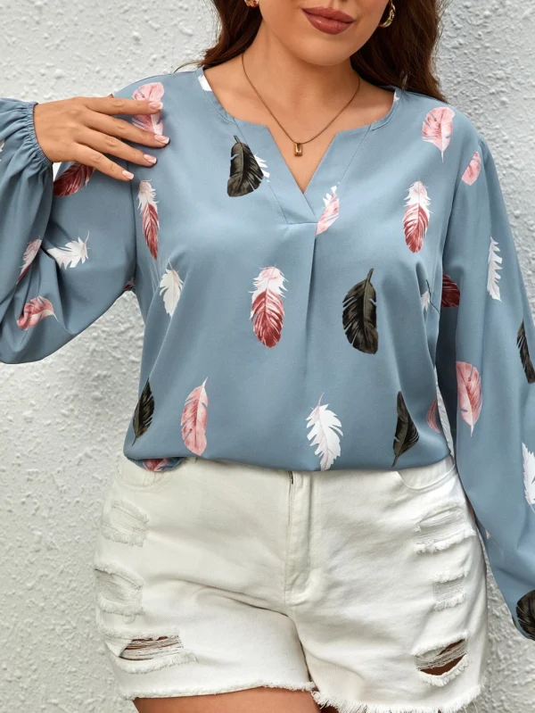 Blusa con estampado de pluma de manga farol azul