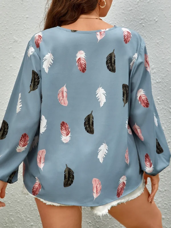 Blusa con estampado de pluma de manga farol azul - Imagen 2