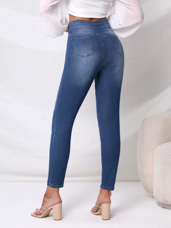 Jeans ajustados de talle alto - Imagen 2
