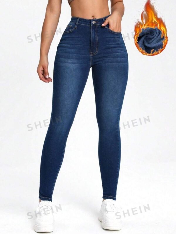 Jeans ajustados cepillado de tela t?rmico con bolsillo oblicuo