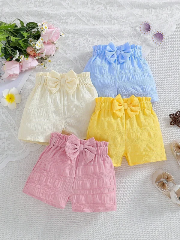 Pantalones cortos con lazo para bebé niña