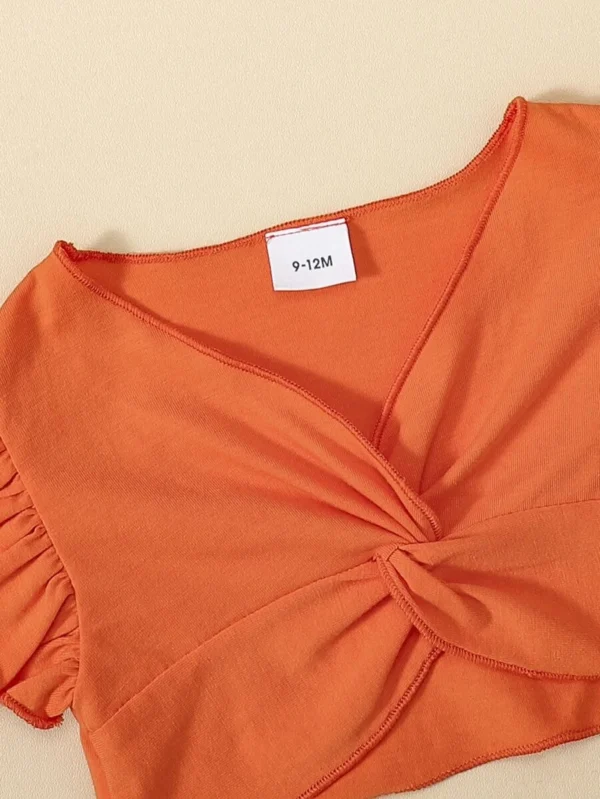 Blusa De Niña Con Borde De Volantes Y La Parte Delantera Torcida Y Falda Con Estampado Floral - Imagen 3