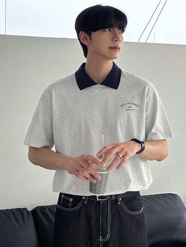 Camisa Polo de manga corta con diseño de bloque de color impreso y eslogan