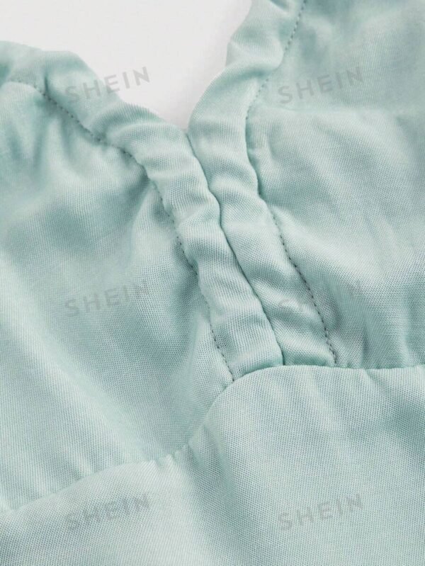 Vestido halter sin espalda de denim azul con lazo en la espalda - Imagen 3