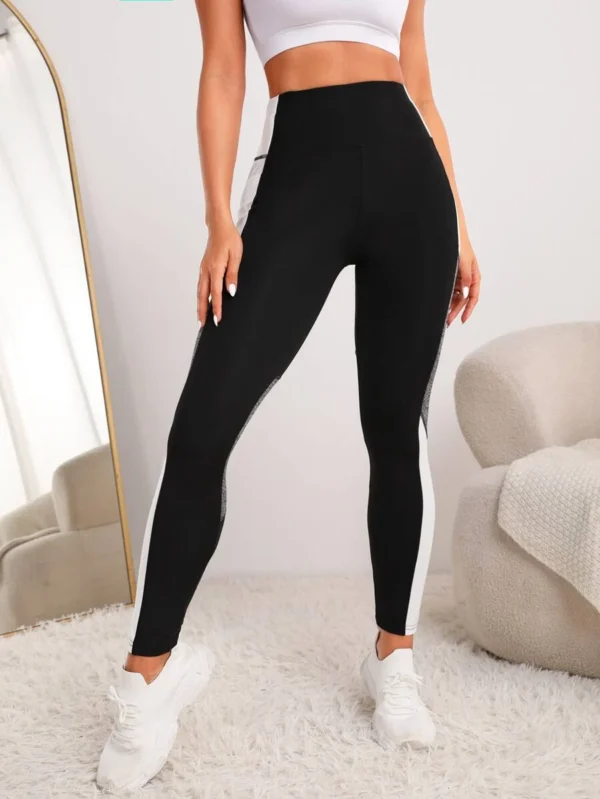 Leggings deportivos de color combinado con bolsillo