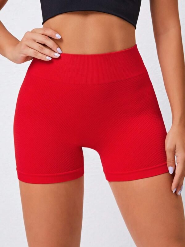 Shorts deportivos unicolor de cintura ancha