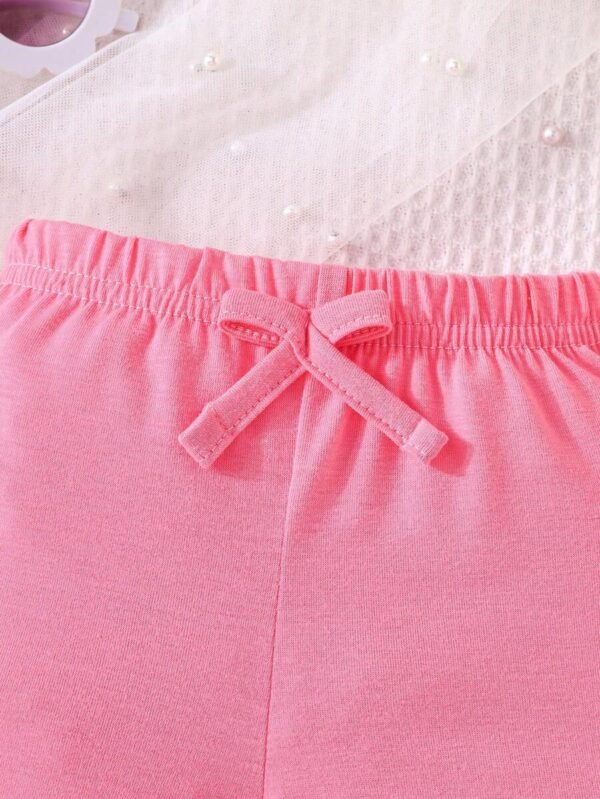 pantalon corto para bebé niña con patrón floral en colores dopamina - Imagen 3