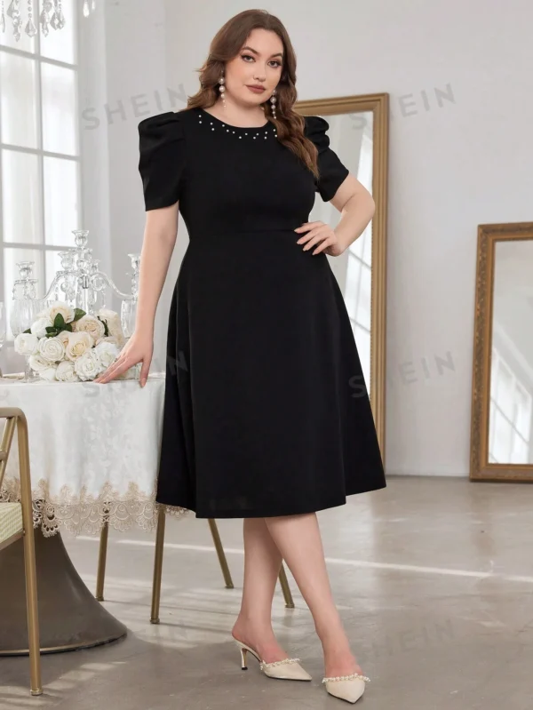 Vestido largo con decoración de perlas y mangas abullonadas - Imagen 2