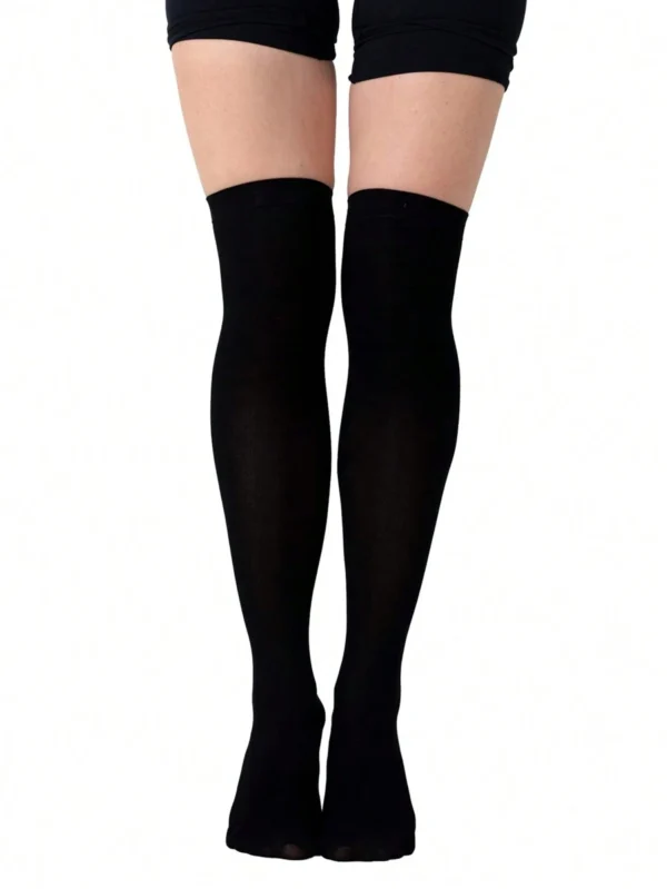 1 par de calcetines blancos hasta la rodilla para mujer