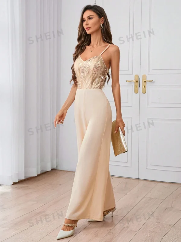Mono elegante de pierna ancha con parches de lentejuelas