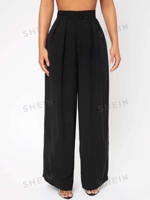 Pantalones negros de vestir de cintura alta con pliegues y pernera ancha