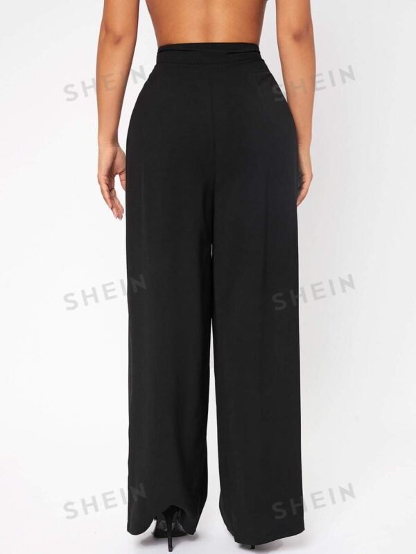 Pantalones negros de vestir de cintura alta con pliegues y pernera ancha - Imagen 2