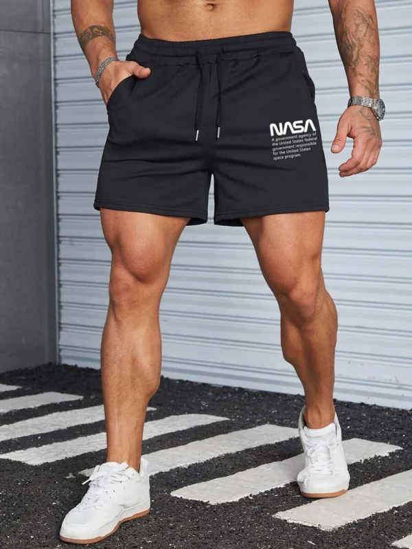 Pantalones cortos de cintura con cordón y gráfico de lema