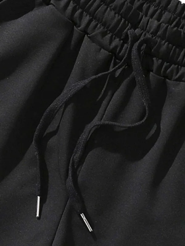 Pantalones cortos de cintura con cordón y gráfico de lema - Imagen 3