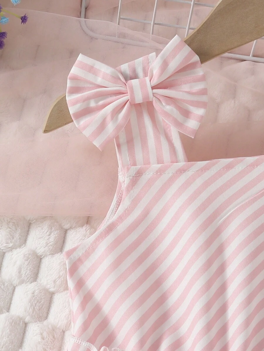 Vestido a rayas de moda para niña joven con cuello asimétrico y decoración de lazo - Imagen 3