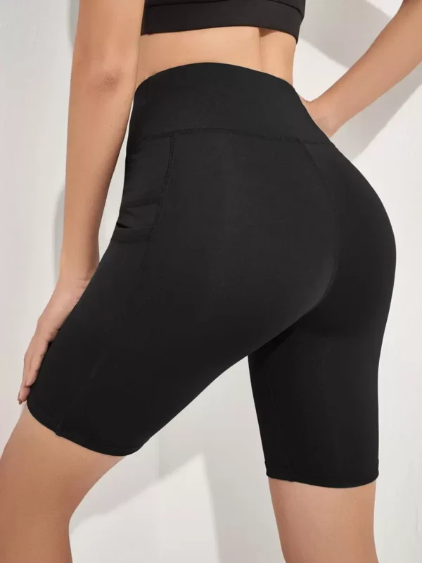 Shorts elásticos sólidos con bolsillo para teléfono para ciclista - Imagen 2