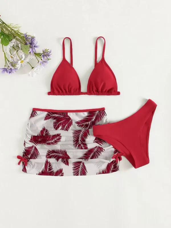 Conjunto de bikini triángulo con estampado tropical y falda de playa