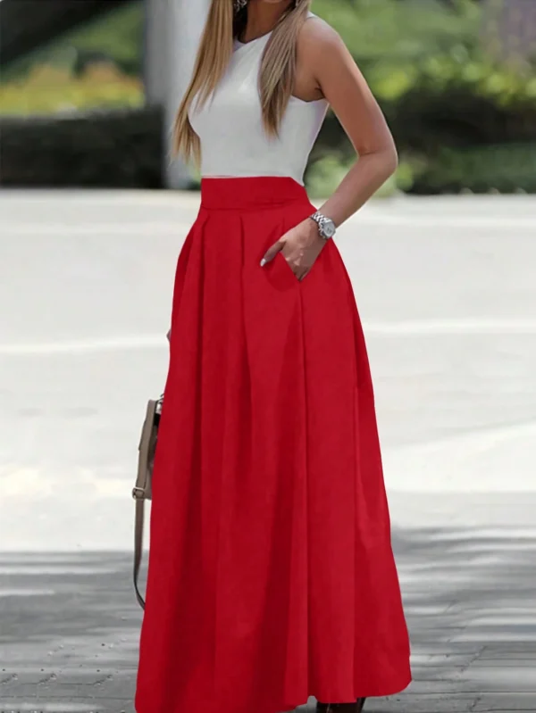 Falda larga elegante de un solo color con bolsillos laterales