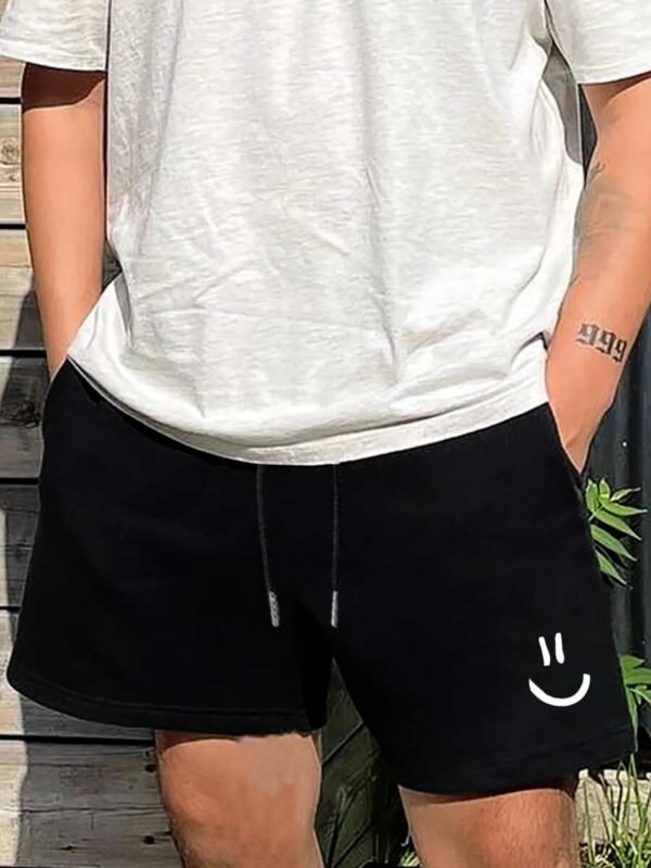Pantalones cortos sueltos para hombres con estampado de expresión - Imagen 3