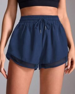 Pantalones cortos deportivos para mujer con contraste de malla