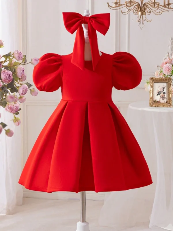 Vestido con gran lazo y espalda calada para niña pequeña