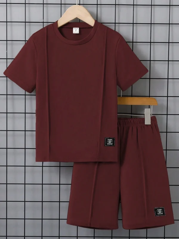 Camiseta de manga corta de cuello redondo de unicolor y shorts - Imagen 3