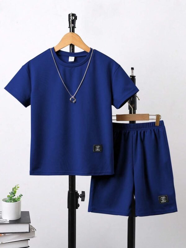 Top de manga corta y pantalones cortos de unicolor