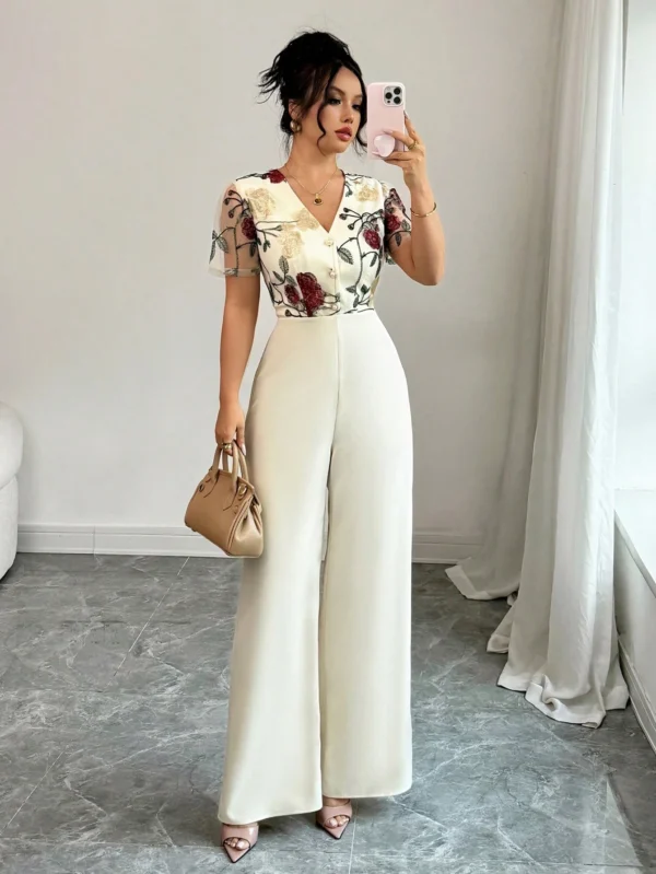 Mono elegante de mujer con cintura recogida, botones y bordado de malla - Imagen 3