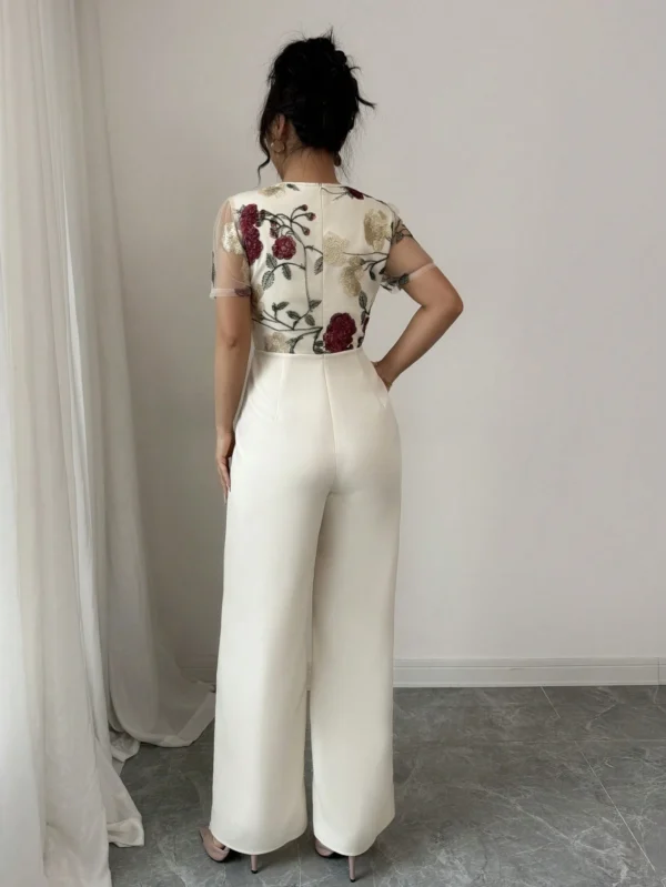 Mono elegante de mujer con cintura recogida, botones y bordado de malla - Imagen 2