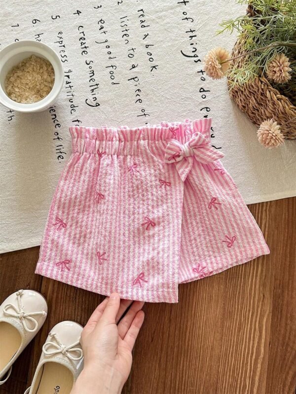 Pantalones cortos de niña bebé con cintura de papel y decoración de lazo