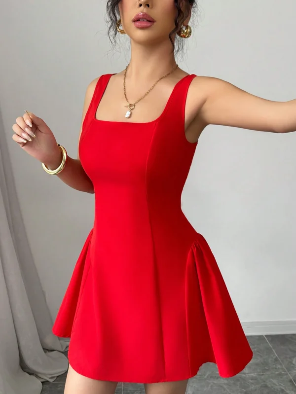 Vestido con decoración de lazo rojo - Imagen 3