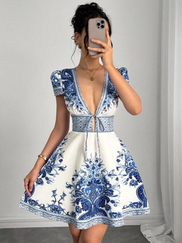 Vestido elegante con cuello en V y estampado floral con lazo