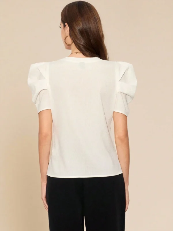 Blusa versátil de manga abullonada con decoración de diamantes - Imagen 2