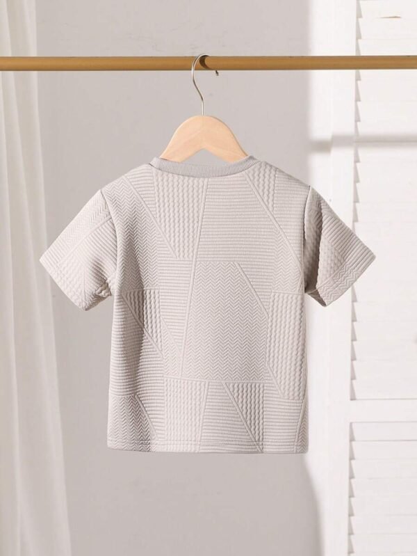 Camiseta de niño de manga corta y cuello redondo de color liso - Imagen 2