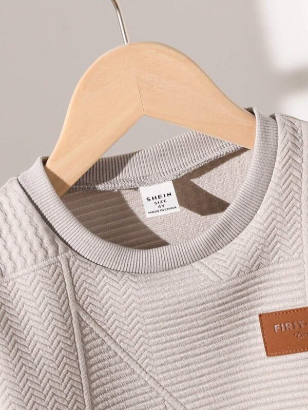 Camiseta de niño de manga corta y cuello redondo de color liso - Imagen 3