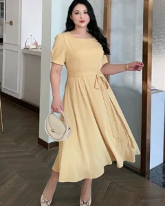 Vestido largo de manga corta y corte evasé de unicolor