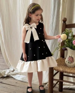 Vestido con volantes, lazo de perlas y estilo francés