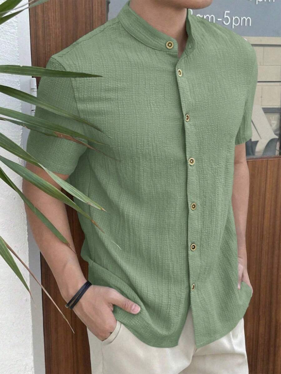 Camisa casual de manga corta y textura sencilla de solapa individual