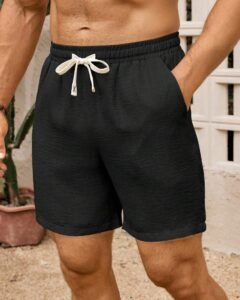 Pantalones cortos con cordón en la cintura y parche con letra