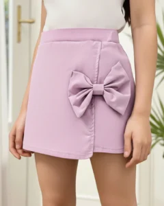 Falda roja elegante con volantes y lazo para niñas