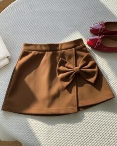 Falda roja elegante con volantes y lazo para niñas