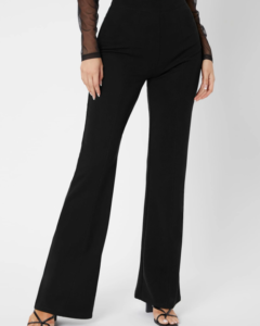 Pantalones palazzo unicolor con cremallera trasera