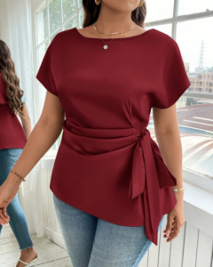 Blusa casual unicolor con mangas de murciélago y nudo lateral