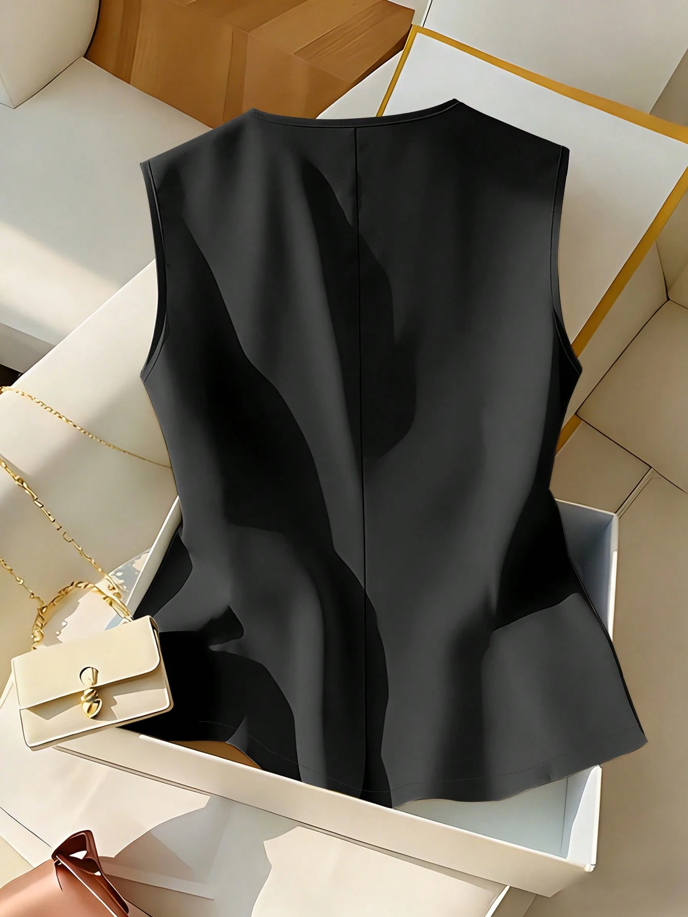 Blusa sin mangas elegante - Imagen 2