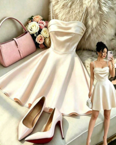 Vestido elegante y versátil sin mangas de tela brillante