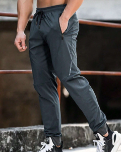 Pants deportivos con cintura con cordón y bolsillo con cremallera