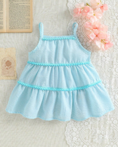 Vestido de bebé niña con rayas, volantes y flecos coloridos